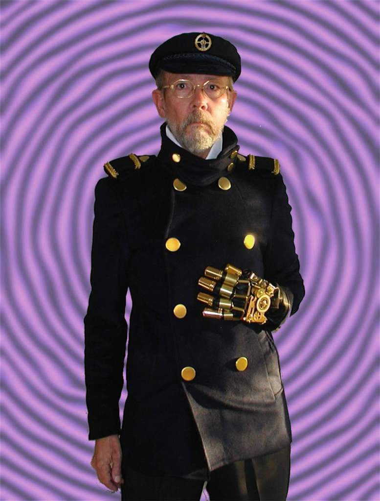 Image of Captain Cogwell's Naval Officer uniform with Starship in this and buttons with mechanical brass hand. 