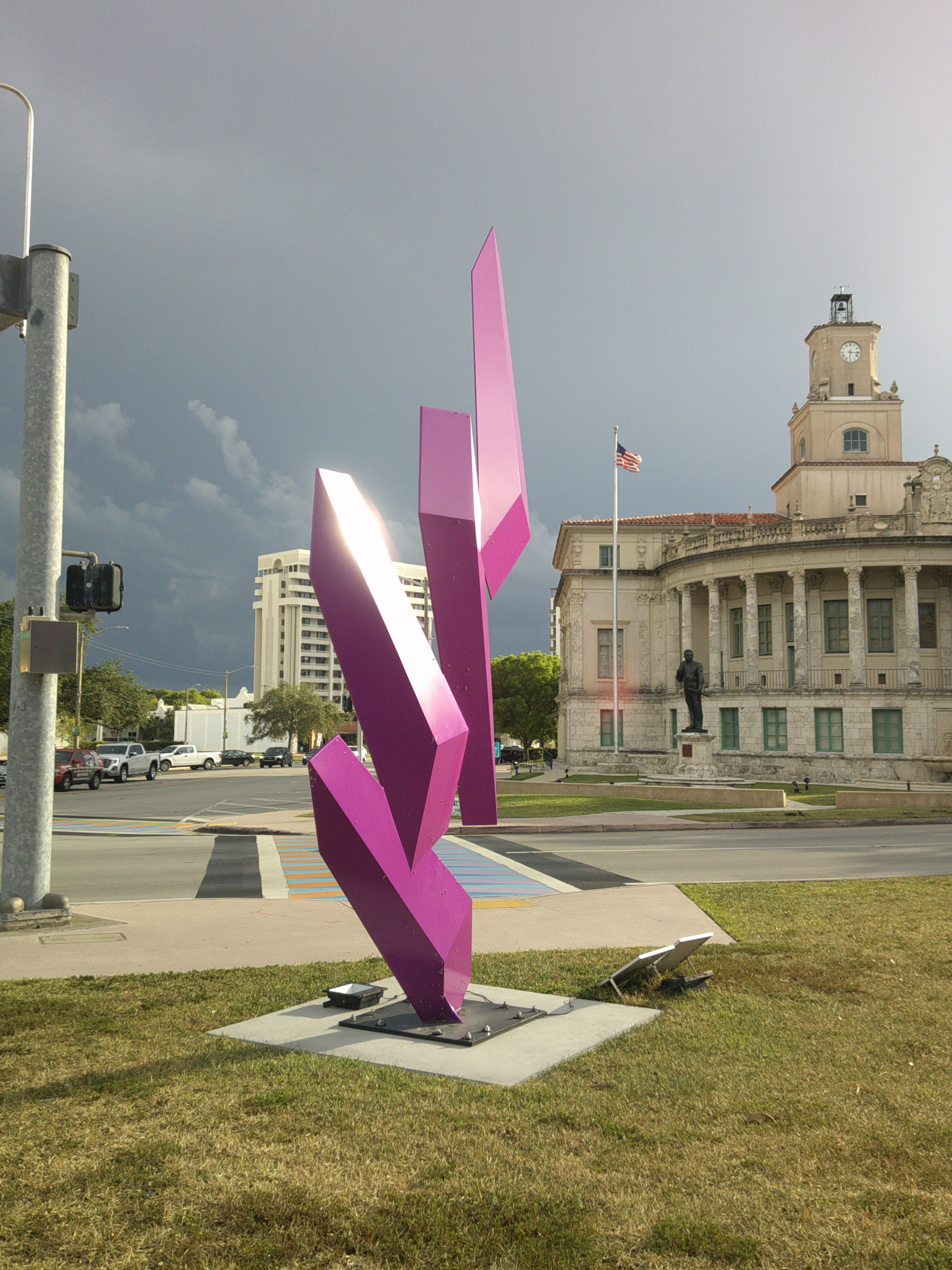 Purple rectangular blocks that seem to be moving through the air, but are static.